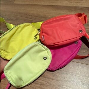 lululemon athletica Red and Pink Crossbody Bags